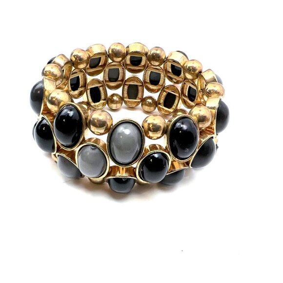 Gold tone stretch bracelet with gray and black cabochons accent. - Picture 1 of 5